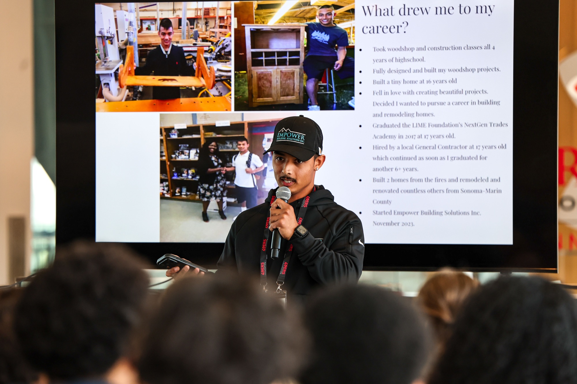 A tradesperson presents to students about what drew them to their career