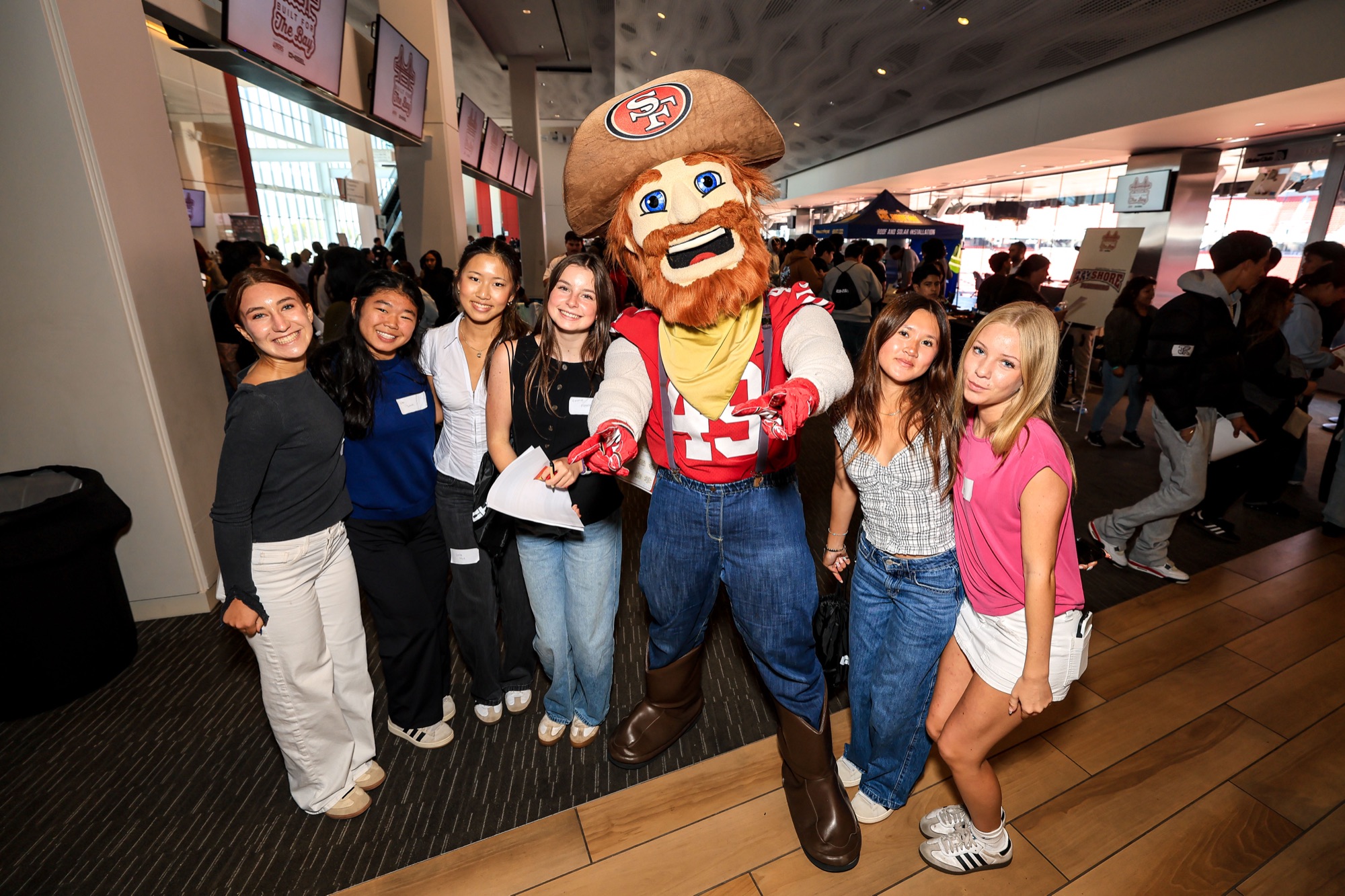 Students pose with Sourdough Sam at Levi's Stadium