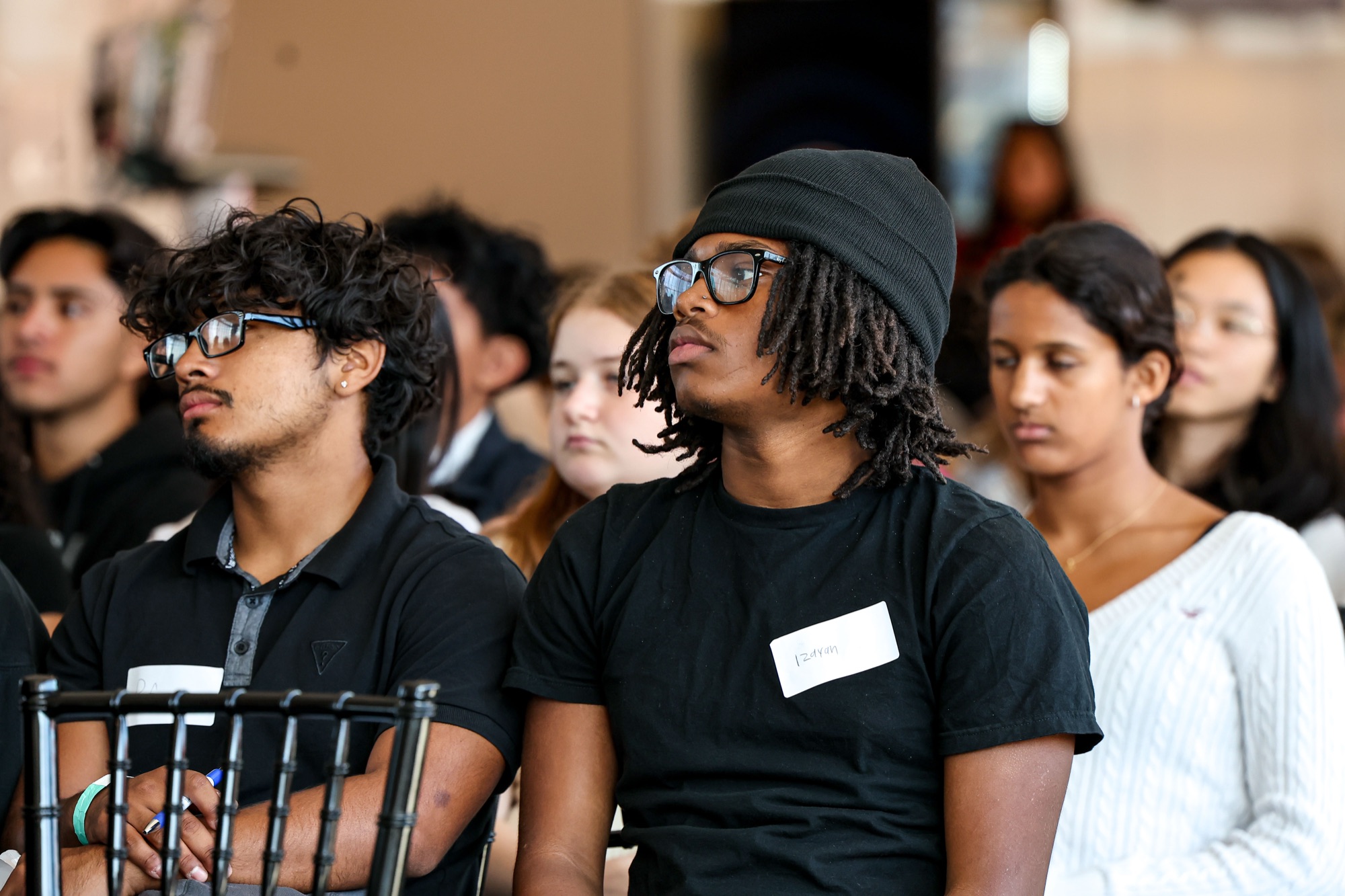 Students listen during a session at Built for the Bay